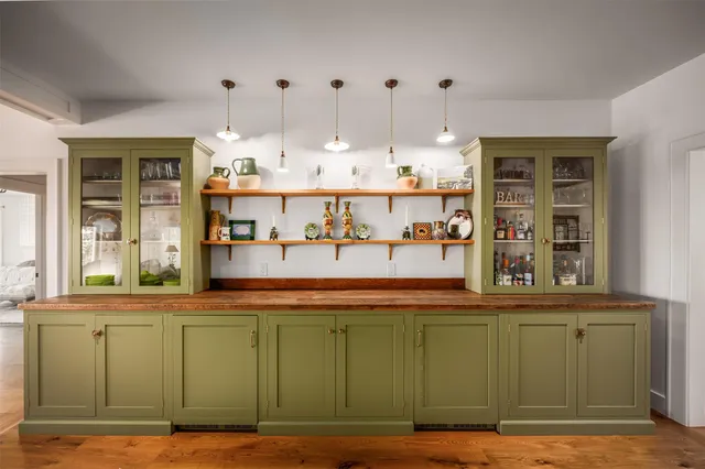 a kitchen with lots of counter space and a window