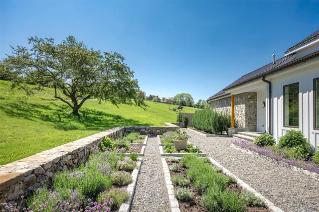 a view of a garden with a patio