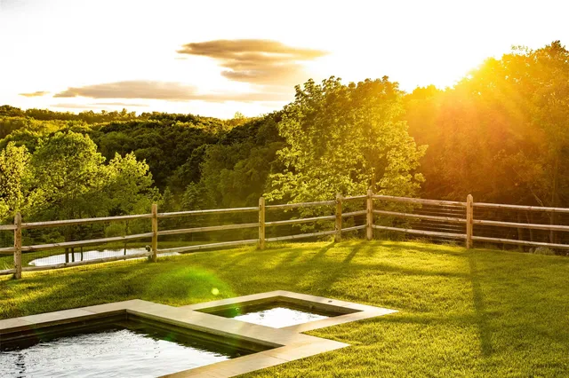 a view of a swimming pool and an ocean