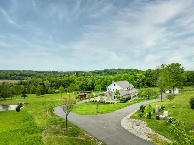 a view of a garden with a fountain