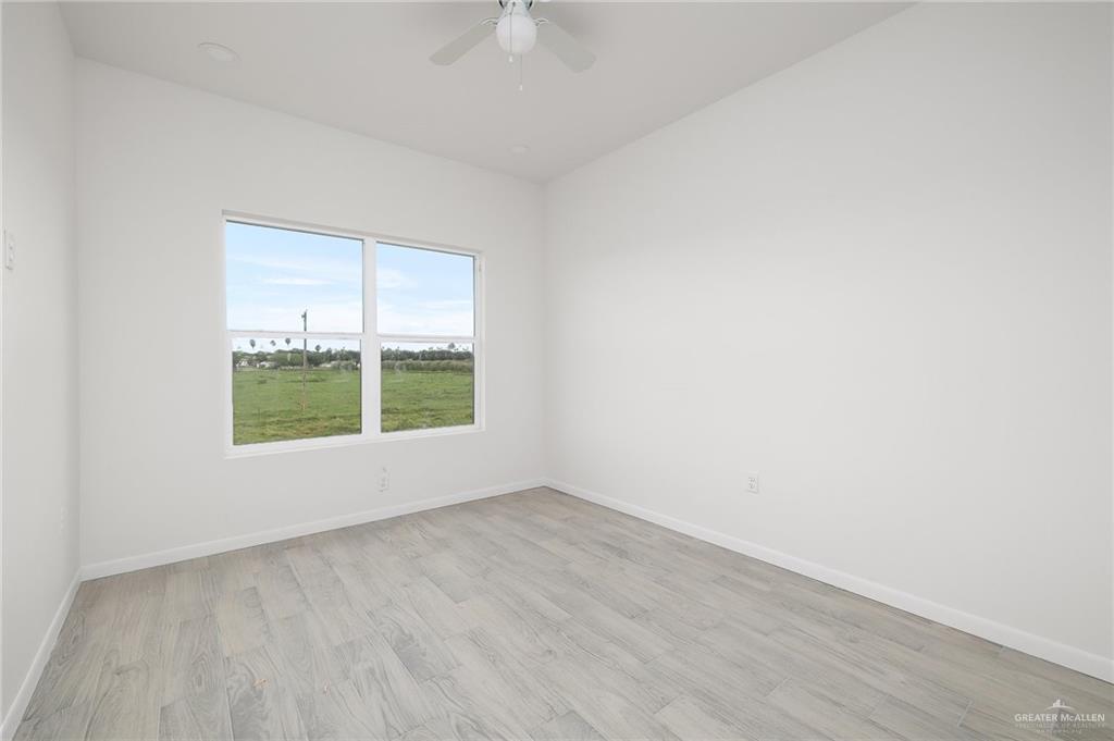 2015 Cassandra Street Mission, TX 78572 - Photo 13 of 15 an empty room with a window
