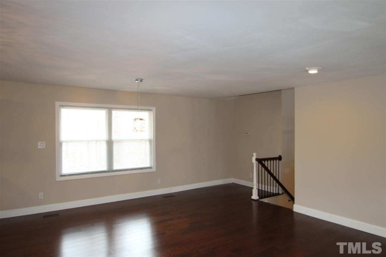 6225 Doyle Road Durham, NC 27712 - Photo 4 of 16 Dining room with new hardwood floors and painted walls