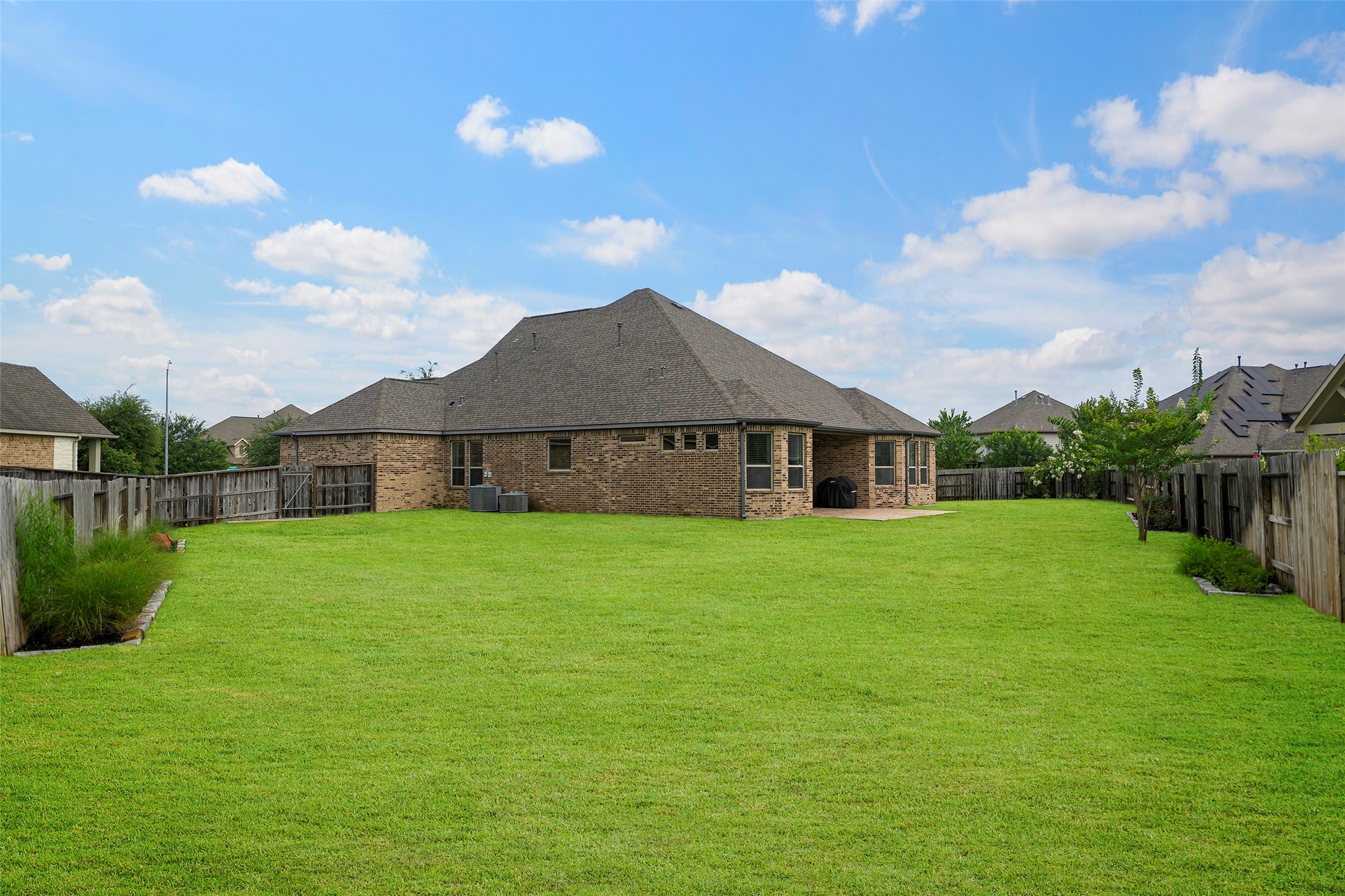 20330 Rosegold Way Spring, TX 77379 - Photo 14 of 48 Expansive backyard offers endless possibilities for a future pool, outdoor kitchen, garden, or play area.