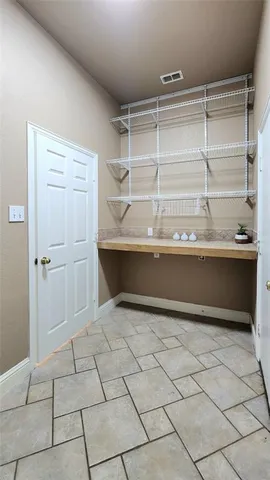 a view of a refrigerator and window