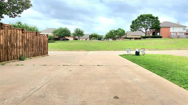 a view of a garden with an outdoor space