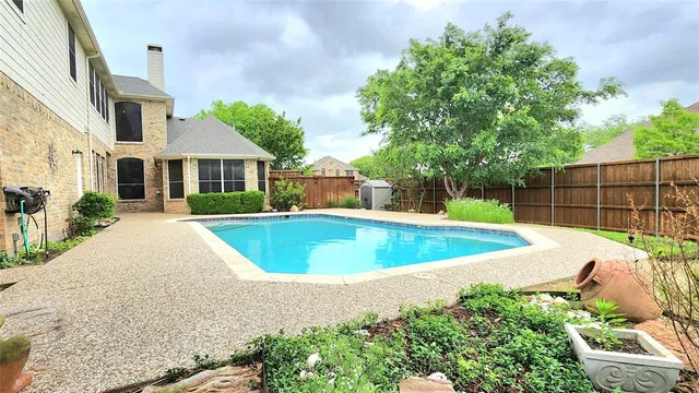 a view of outdoor space yard and swimming pool