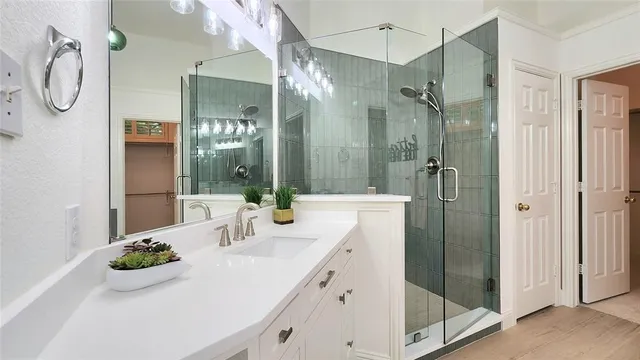 a bathroom with a double vanity sink mirror and double