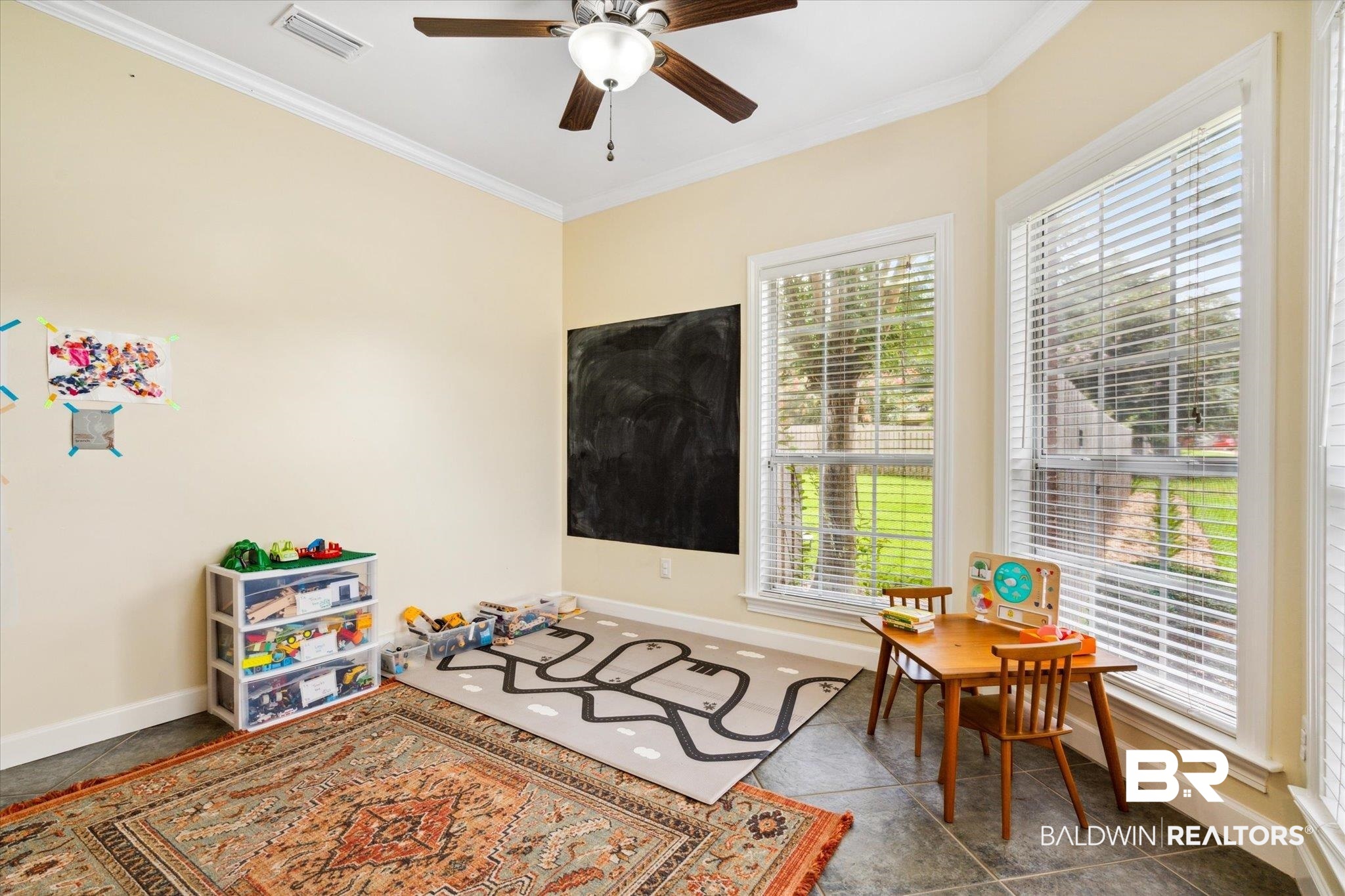 1561 William Dunn Way Mobile, AL 36695 - Photo 9 of 28 Game room featuring ornamental molding, tile patterned flooring, ceiling fan, and a healthy amount of sunlight