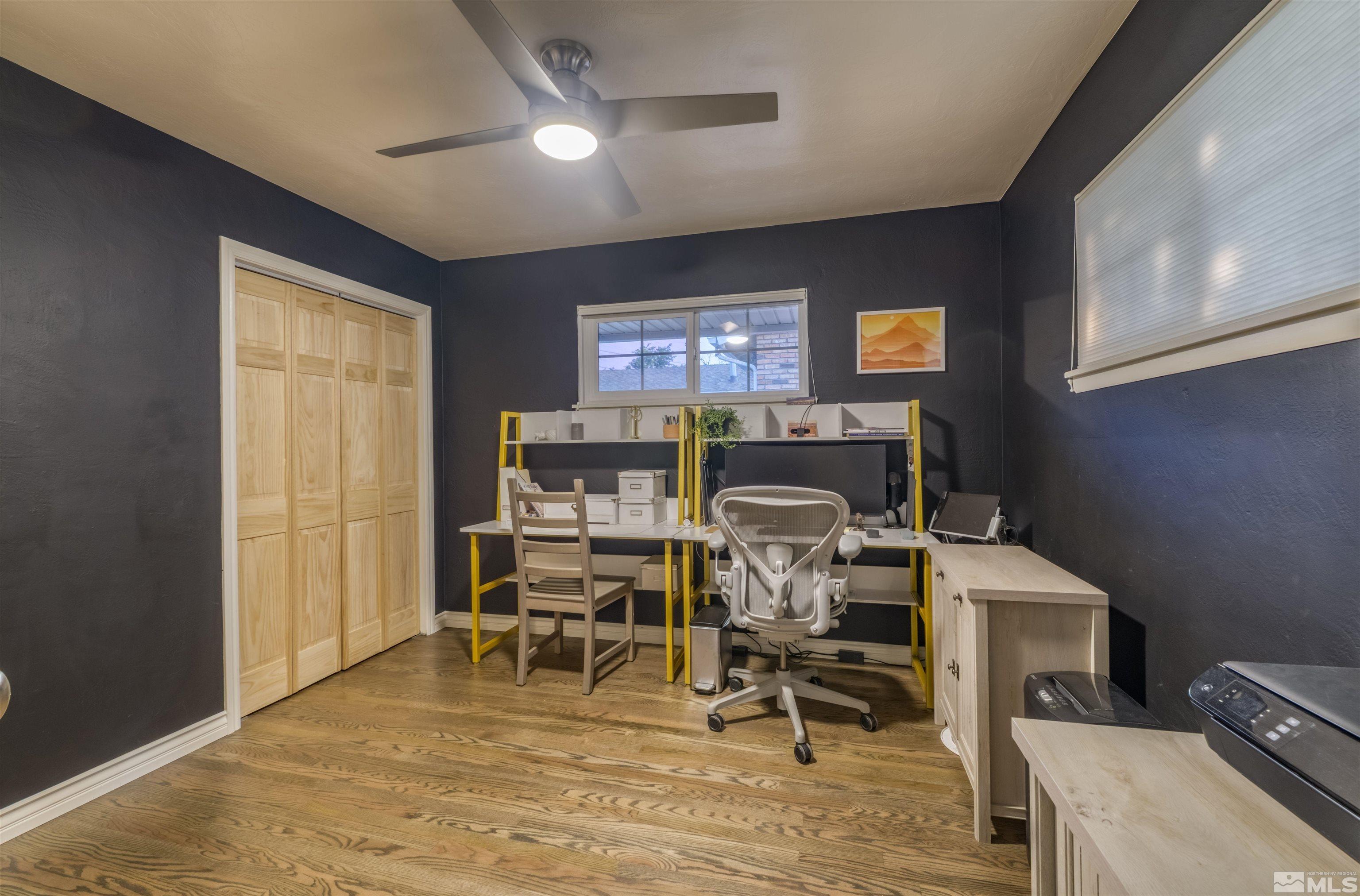 1795 Hunter Lake Drive Reno, NV 89509 - Photo 13 of 32 a work room with furniture and a window