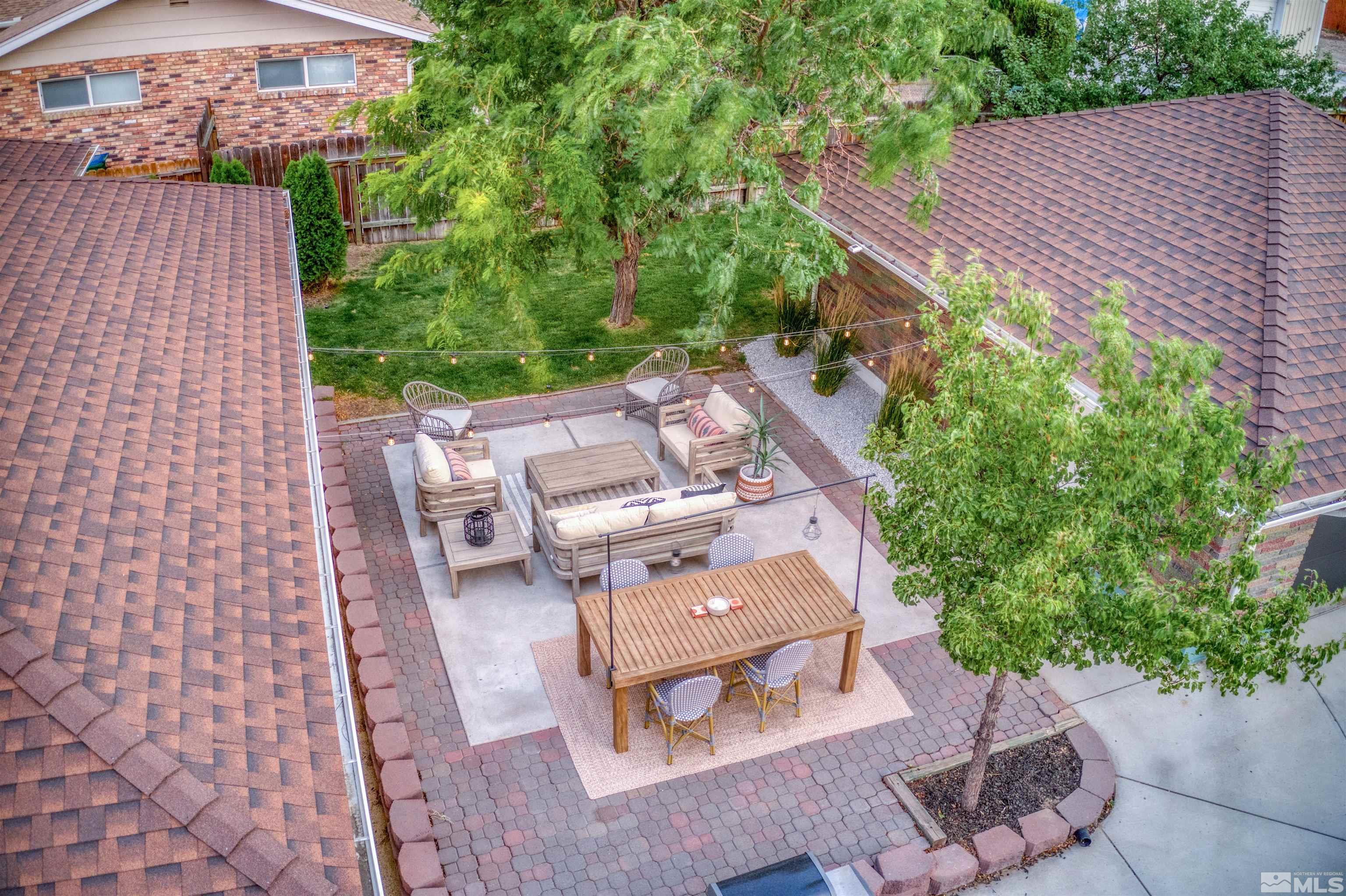 1795 Hunter Lake Drive Reno, NV 89509 - Photo 21 of 32 an aerial view of a house with garden space and street view