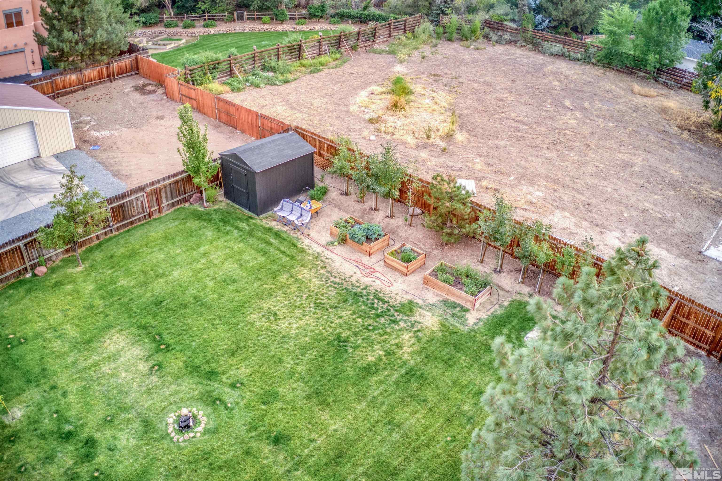 1795 Hunter Lake Drive Reno, NV 89509 - Photo 29 of 32 an aerial view of a house with garden space and street view