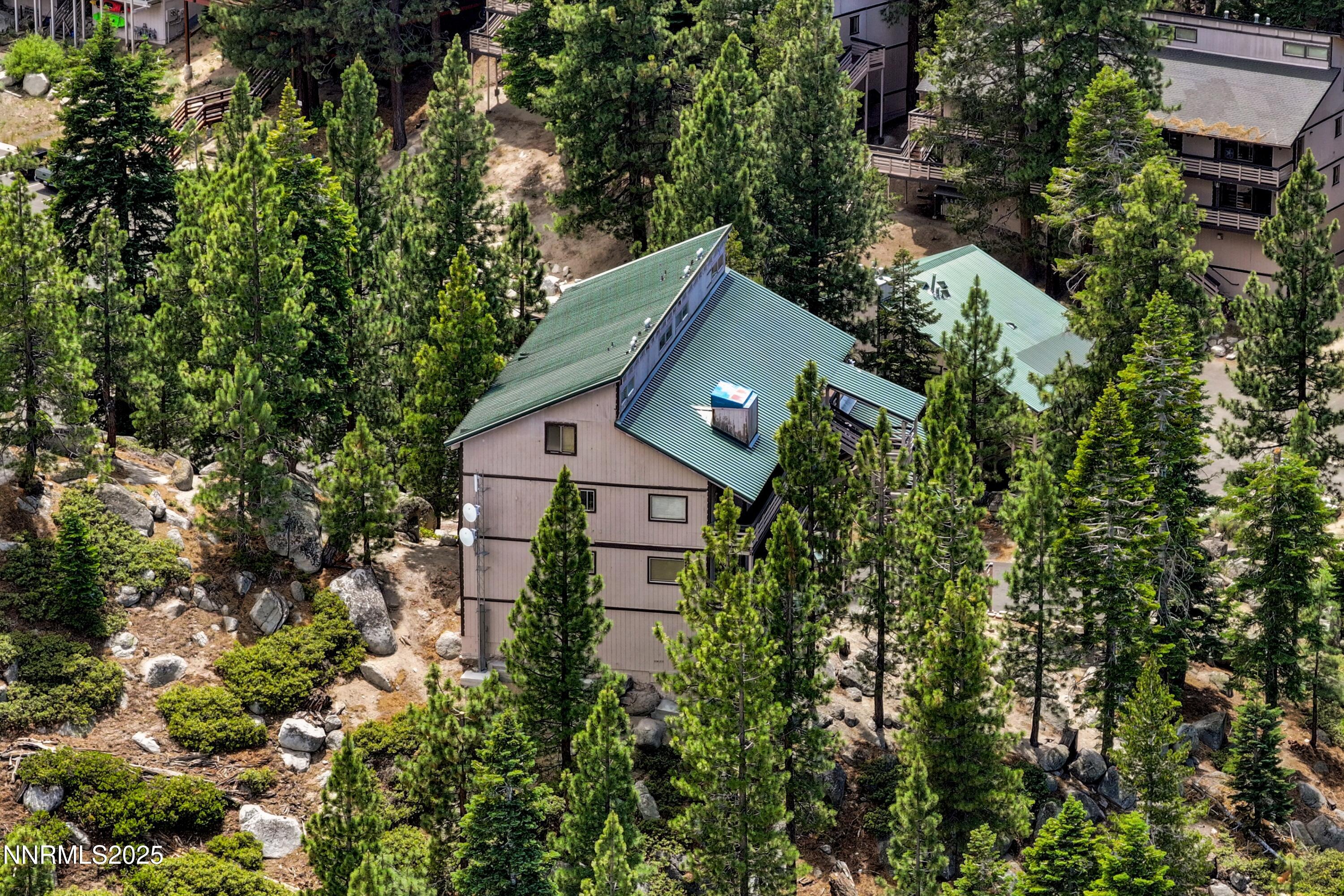 305 Galaxy Lane, Unit 3 Stateline, NV 89449 - Photo 18 of 49 an aerial view of house with yard and outdoor seating