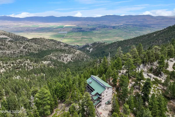 a view of a wooden floor and a yard