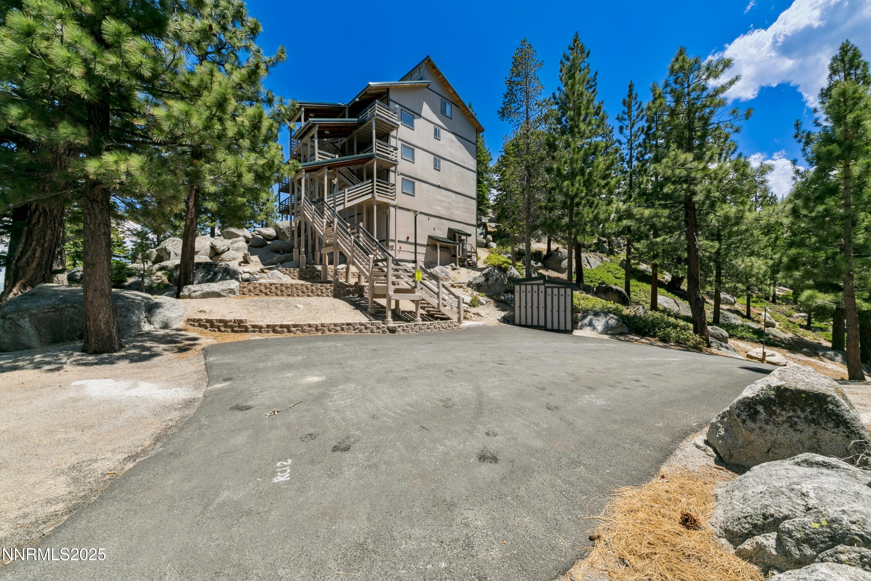 305 Galaxy Lane, Unit 3 Stateline, NV 89449 - Photo 26 of 49 a view of a house with a yard and tree s