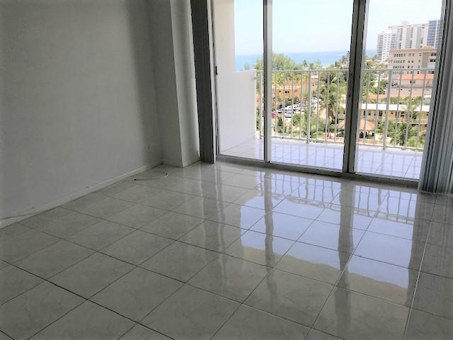 111 Briny Avenue, Unit 806 Pompano Beach, FL 33062 - Photo 11 of 40 a view of an empty room and window