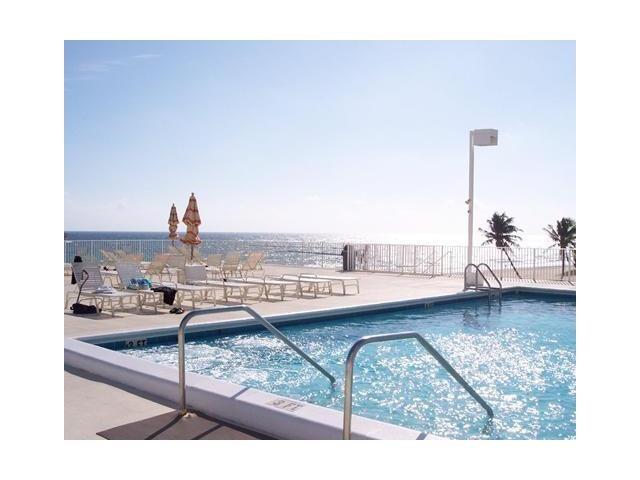 111 Briny Avenue, Unit 806 Pompano Beach, FL 33062 - Photo 23 of 40 a picture of a floor plan and a living room