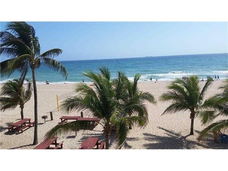 111 Briny Avenue, Unit 806 Pompano Beach, FL 33062 - Photo 26 of 40 a picture of a potted plants by a beach