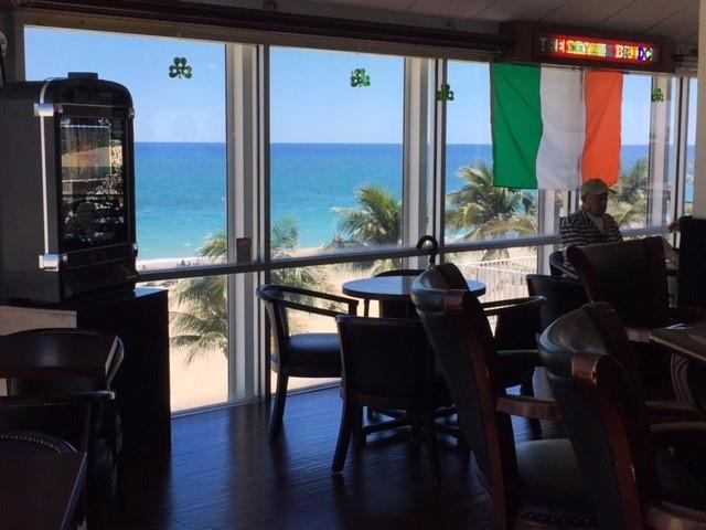 111 Briny Avenue, Unit 806 Pompano Beach, FL 33062 - Photo 33 of 40 a view of a dining room with furniture window and outside view
