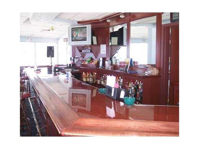 111 Briny Avenue, Unit 806 Pompano Beach, FL 33062 - Photo 34 of 40 a view of living room and kitchen