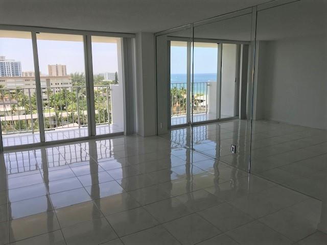 111 Briny Avenue, Unit 806 Pompano Beach, FL 33062 - Photo 10 of 40 a bathroom with a glass door