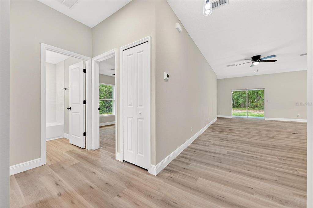 2132 Pine Meadows Golf Course Road Eustis, FL 32726 - Photo 18 of 62 a view of an empty room with wooden floor
