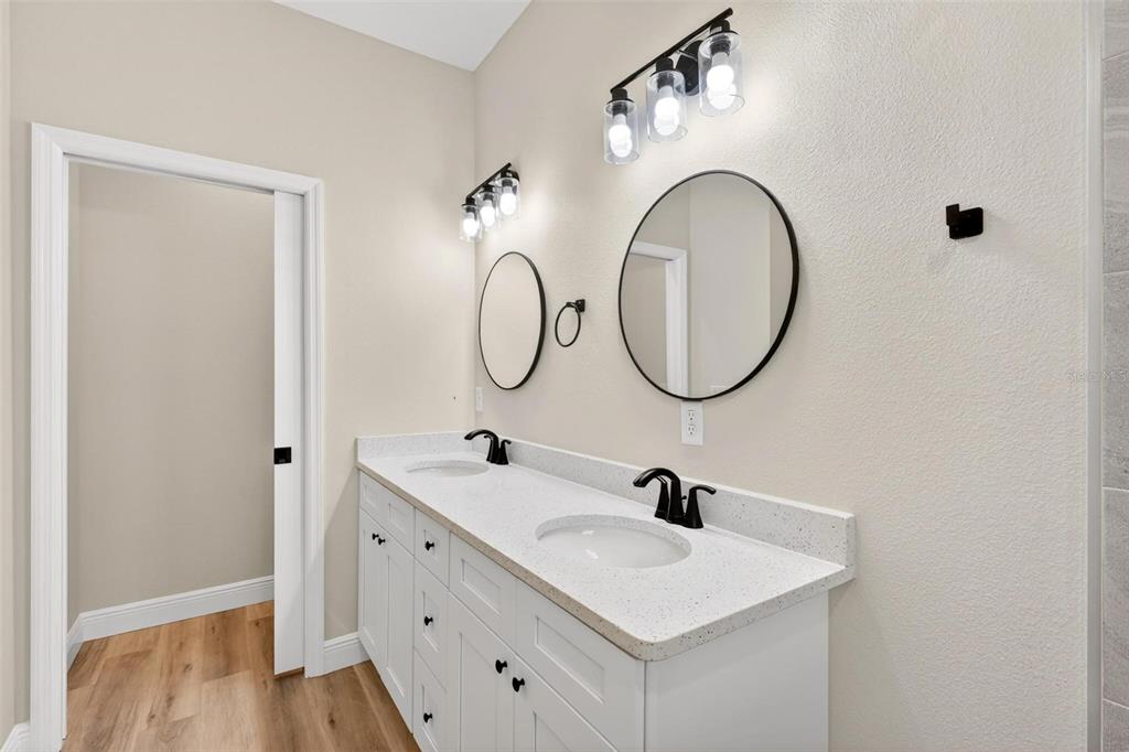 2132 Pine Meadows Golf Course Road Eustis, FL 32726 - Photo 28 of 62 a bathroom with a sink and a mirror
