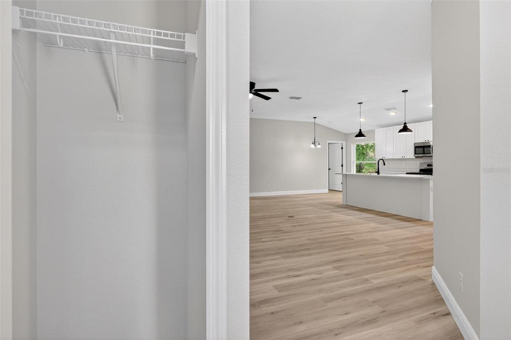 2132 Pine Meadows Golf Course Road Eustis, FL 32726 - Photo 46 of 62 a view of a kitchen from the hallway