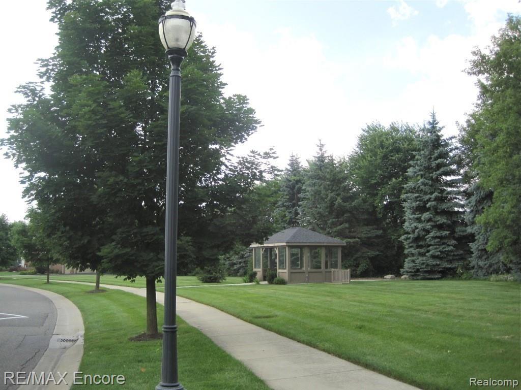 6775 Oakhurst Ridge Road Clarkston, MI 48348 - Photo 37 of 37 Oakhurst Street Lights, Sidewalk and Bus Shelter