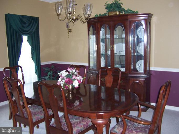 5957 Sandy Ridge Elkridge, MD 21075 - Photo 6 of 30 Two Floor Length Windows & Crown Moulding