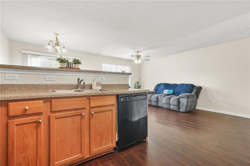 7104 Georges Way Morrow, GA 30260 - Photo 15 of 39 a spacious bathroom with a granite countertop sink and a mirror