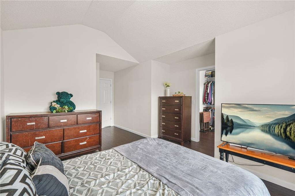7104 Georges Way Morrow, GA 30260 - Photo 22 of 39 a bedroom with a bed and a dresser