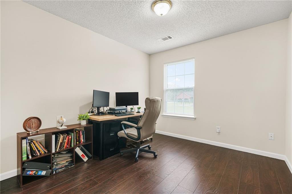 7104 Georges Way Morrow, GA 30260 - Photo 28 of 39 a view of a workspace with furniture and a window