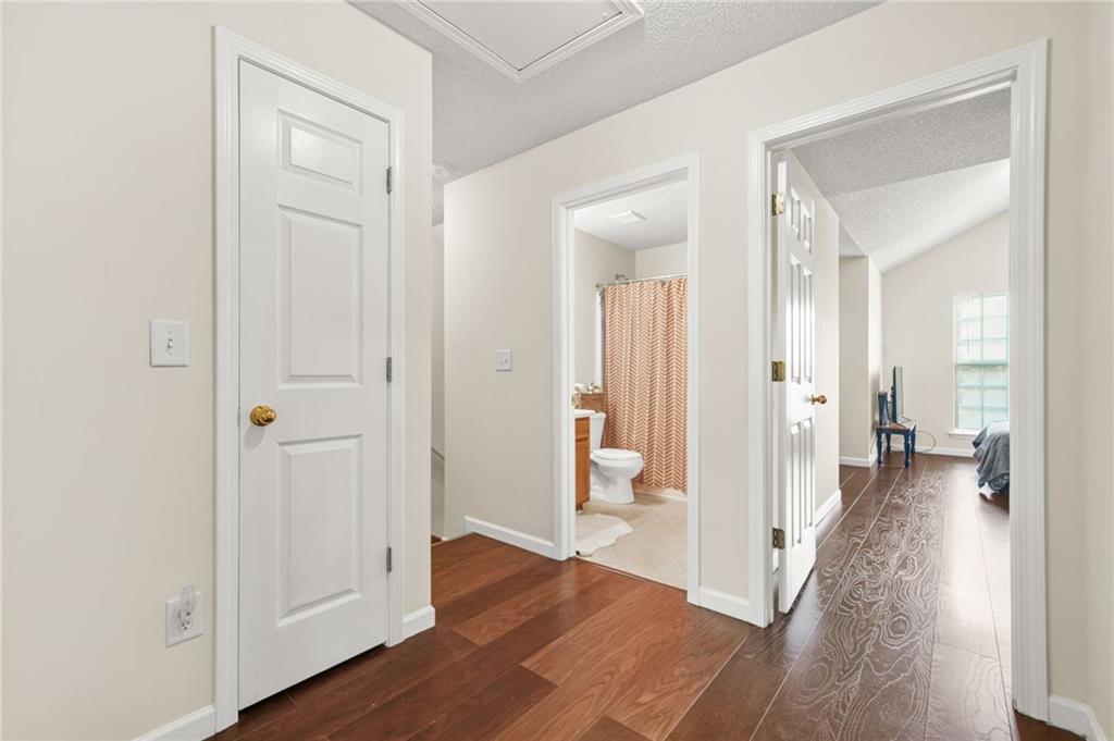 7104 Georges Way Morrow, GA 30260 - Photo 30 of 39 a view of a hallway with wooden floor