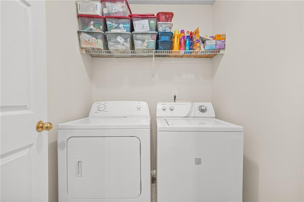 7104 Georges Way Morrow, GA 30260 - Photo 33 of 39 a utility room with dryer and washer