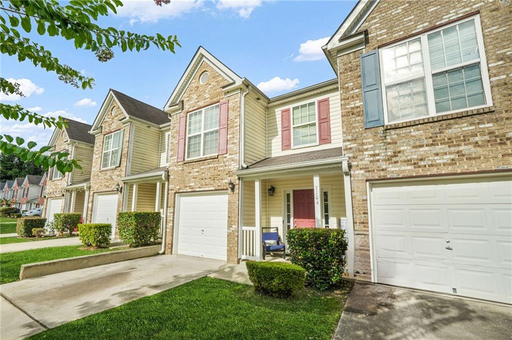 7104 Georges Way Morrow, GA 30260 - Photo 6 of 39 front view of a house with a yard
