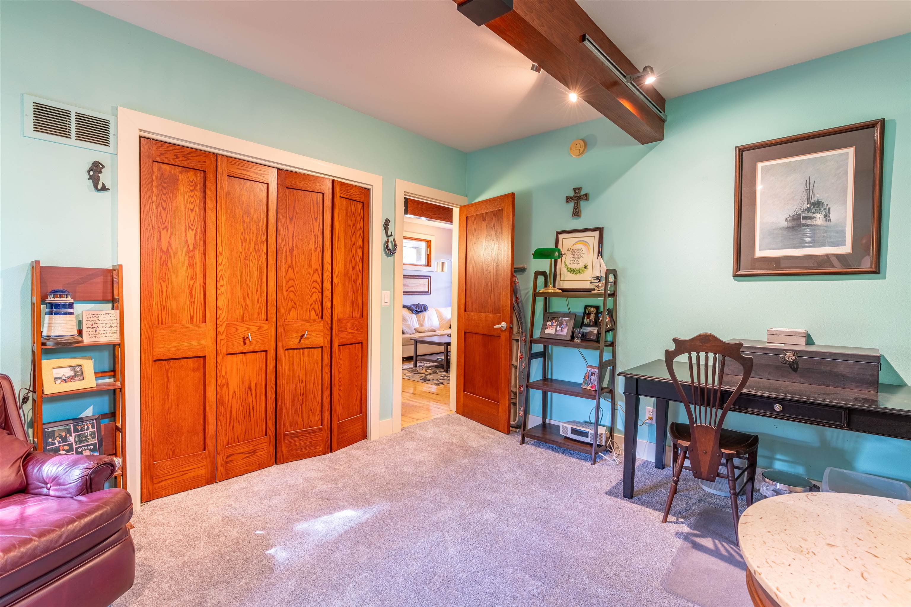4609 Brookview Road Rockford, IL 61107 - Photo 21 of 44 a bed room with a bed and a book shelf