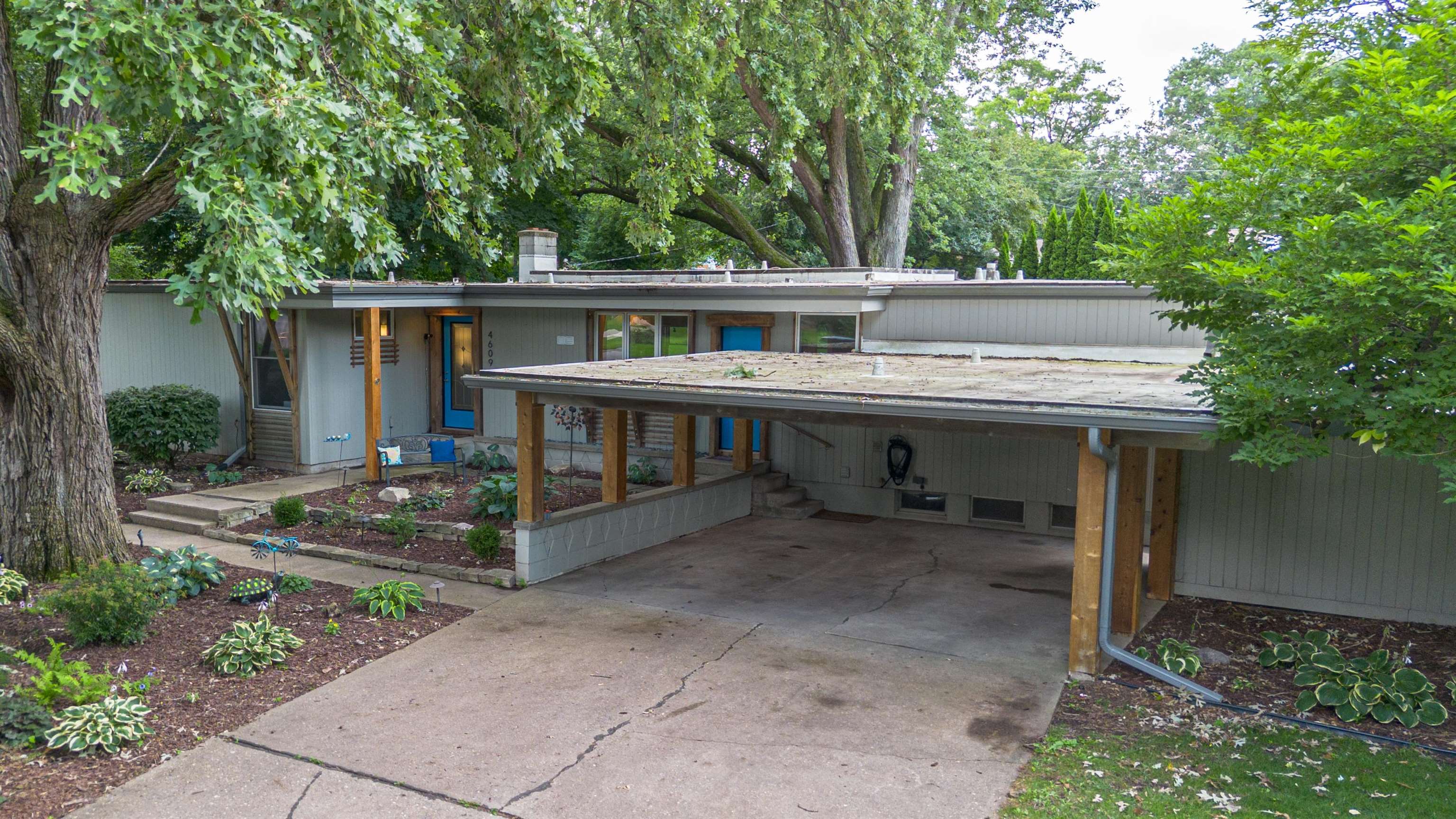 4609 Brookview Road Rockford, IL 61107 - Photo 43 of 44 a view of a house with a yard and sitting area