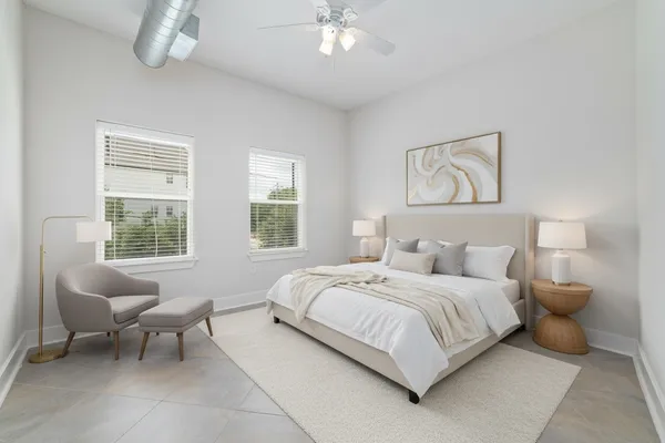 a bathroom with a double vanity sink toilet and shower