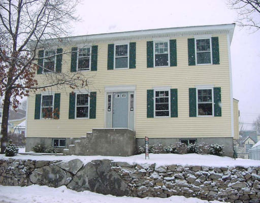 58 Edgemere Road Boston, MA 02132 - Photo 1 of 1 a front view of a house with a yard