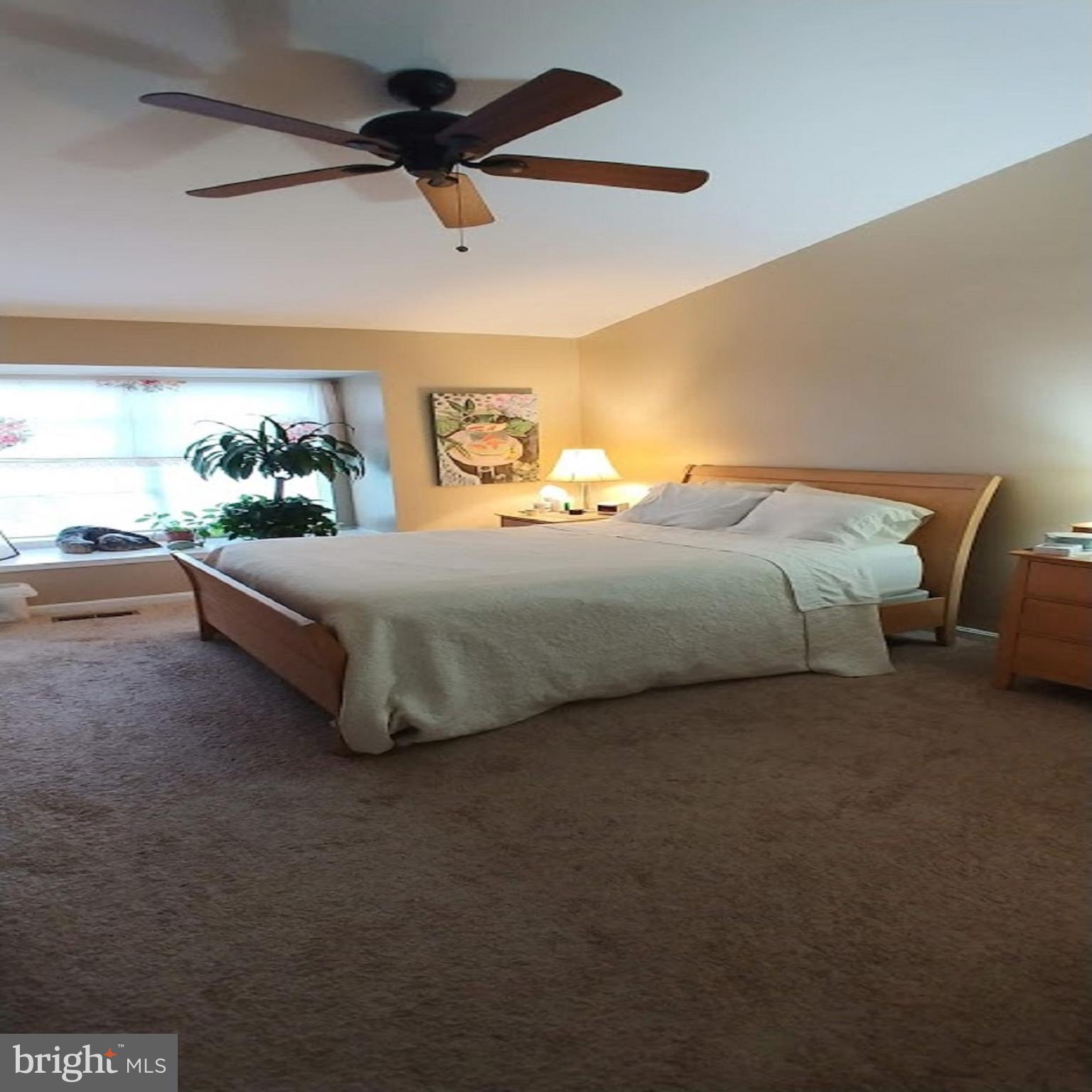 28 Suncroft Court Silver Spring, MD 20904 - Photo 20 of 21 a bedroom with a bed and a couch