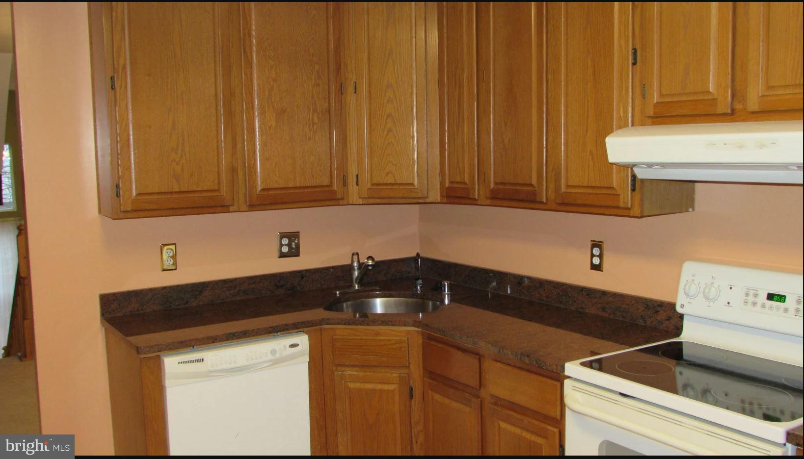 28 Suncroft Court Silver Spring, MD 20904 - Photo 5 of 21 a kitchen with a sink and cabinets