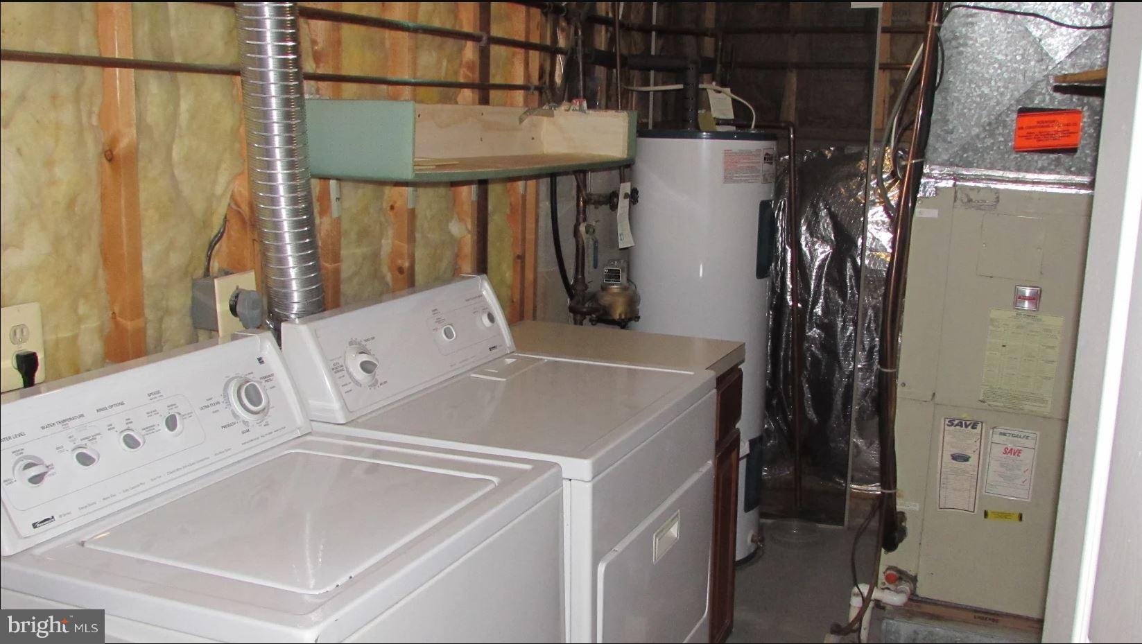 28 Suncroft Court Silver Spring, MD 20904 - Photo 7 of 21 a utility room with dryer and washer
