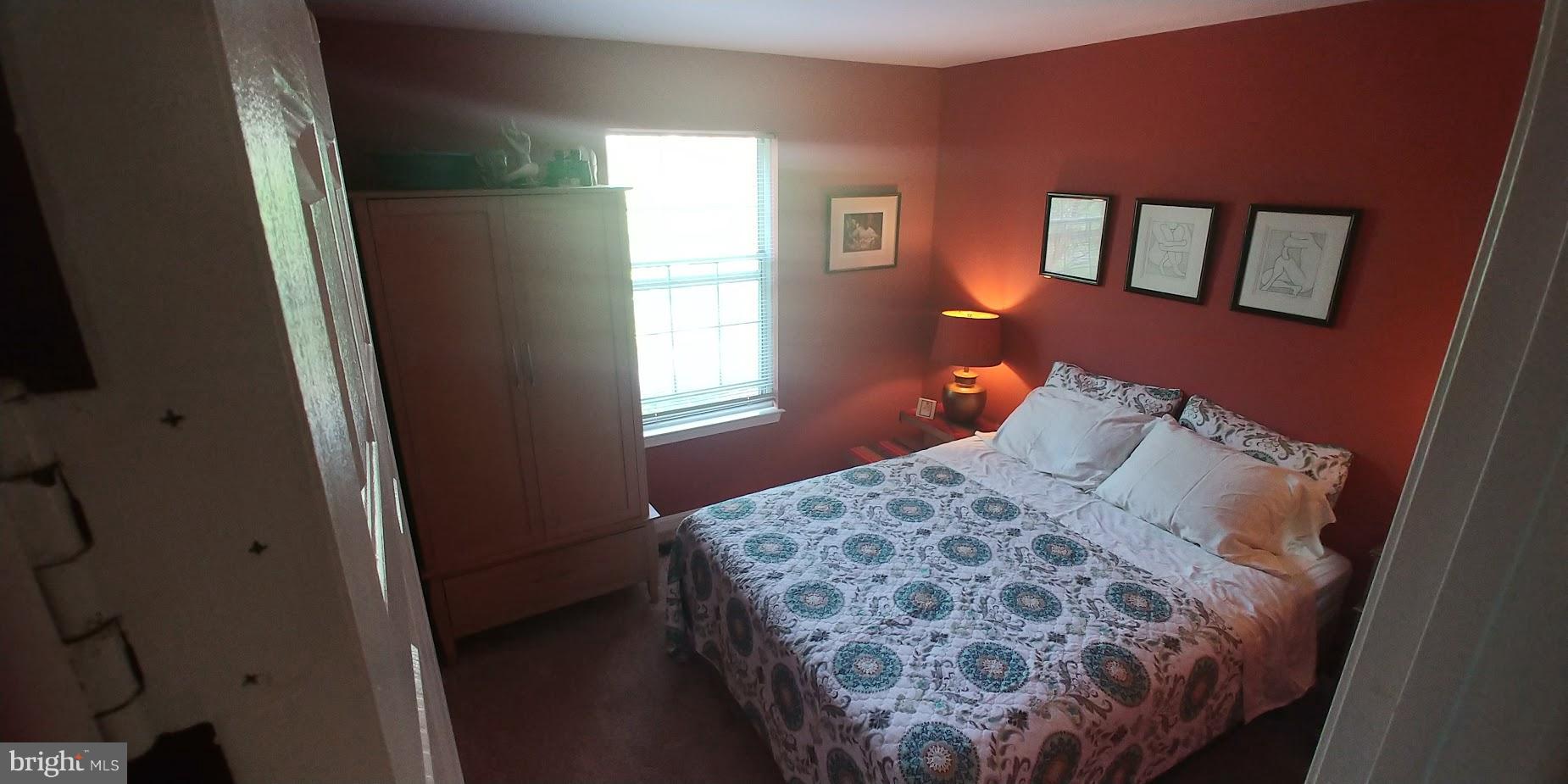 28 Suncroft Court Silver Spring, MD 20904 - Photo 9 of 21 a bedroom with a bed and a window