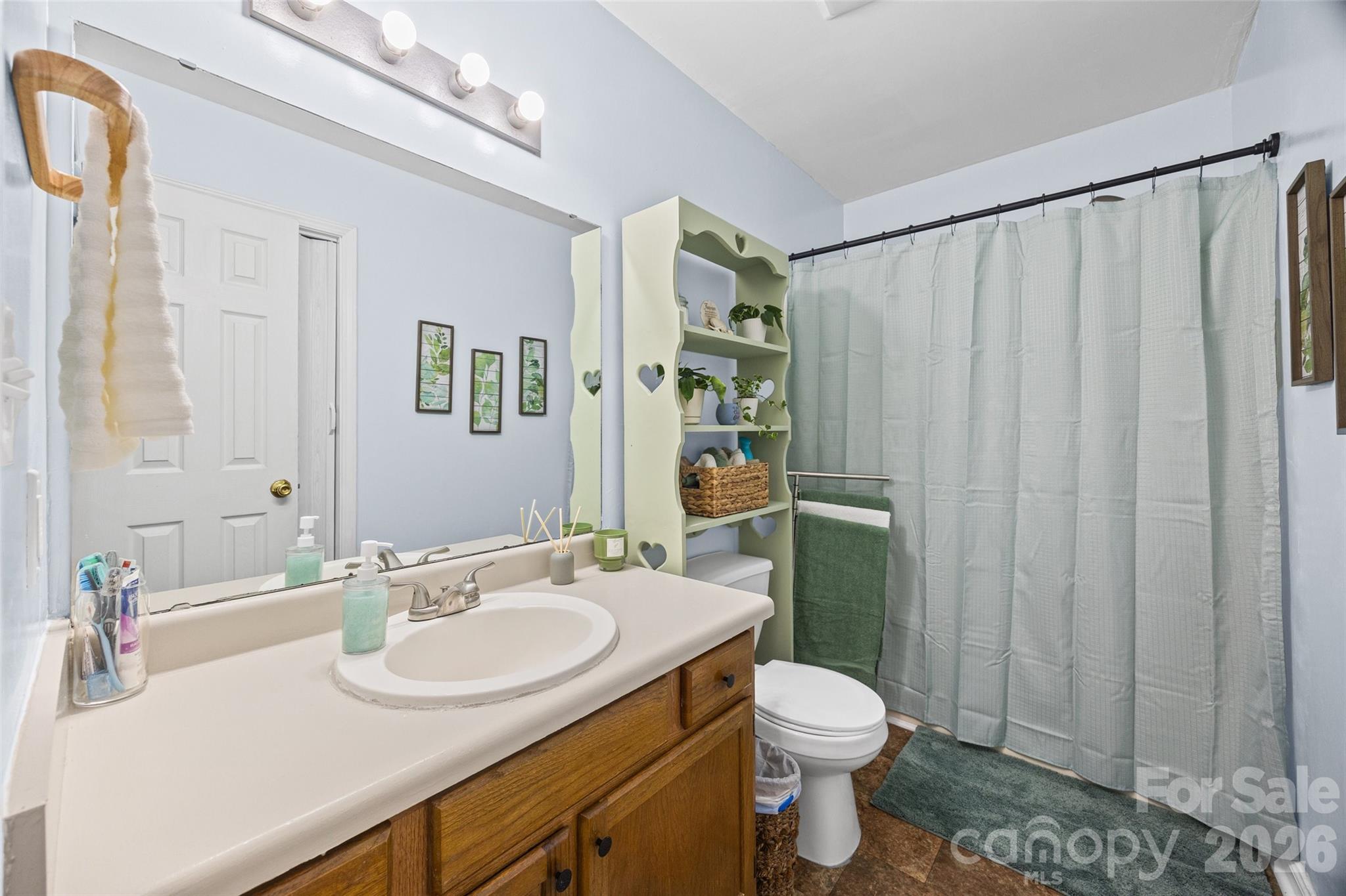 30 7th Street York, SC 29745 - Photo 18 of 29 a bathroom with a sink toilet and shower