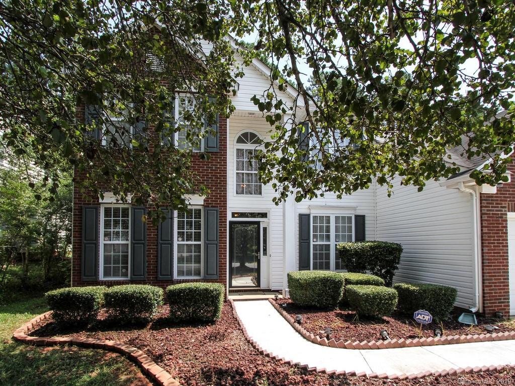 6924 Reedy Creek Road Charlotte, NC 28215 - Photo 3 of 47 a front view of a house with garden