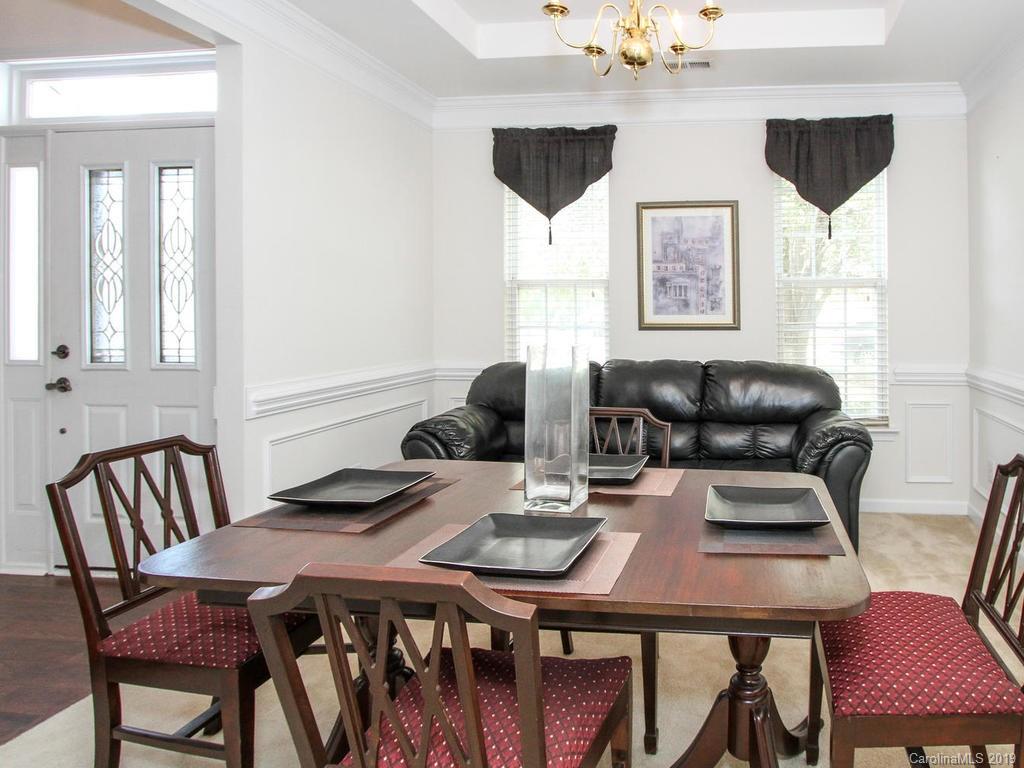 6924 Reedy Creek Road Charlotte, NC 28215 - Photo 7 of 47 a dining room with furniture and window