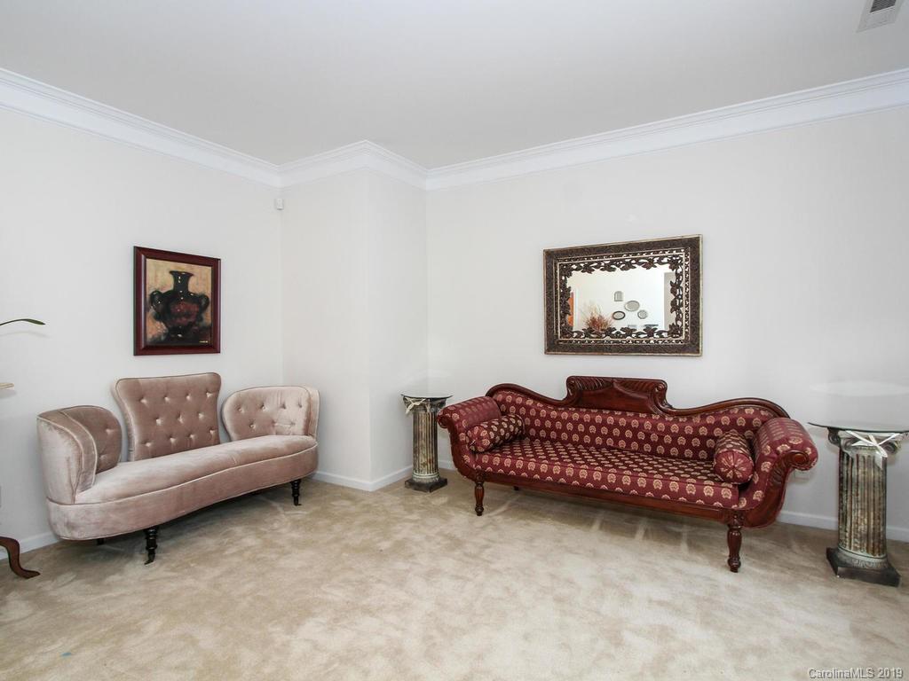 6924 Reedy Creek Road Charlotte, NC 28215 - Photo 8 of 47 a living room with furniture and a couch