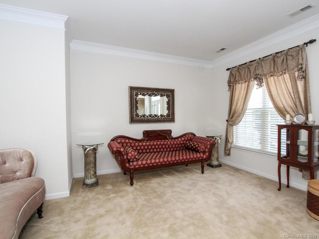 6924 Reedy Creek Road Charlotte, NC 28215 - Photo 9 of 47 a living room with furniture and a window