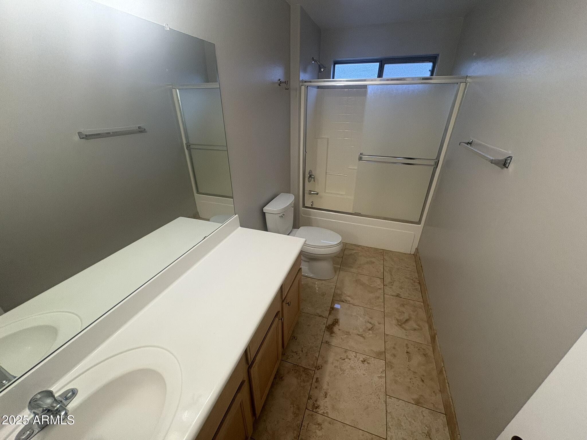 17633 North 41st Street Phoenix, AZ 85032 - Photo 16 of 24 a bathroom with a sink and a shower