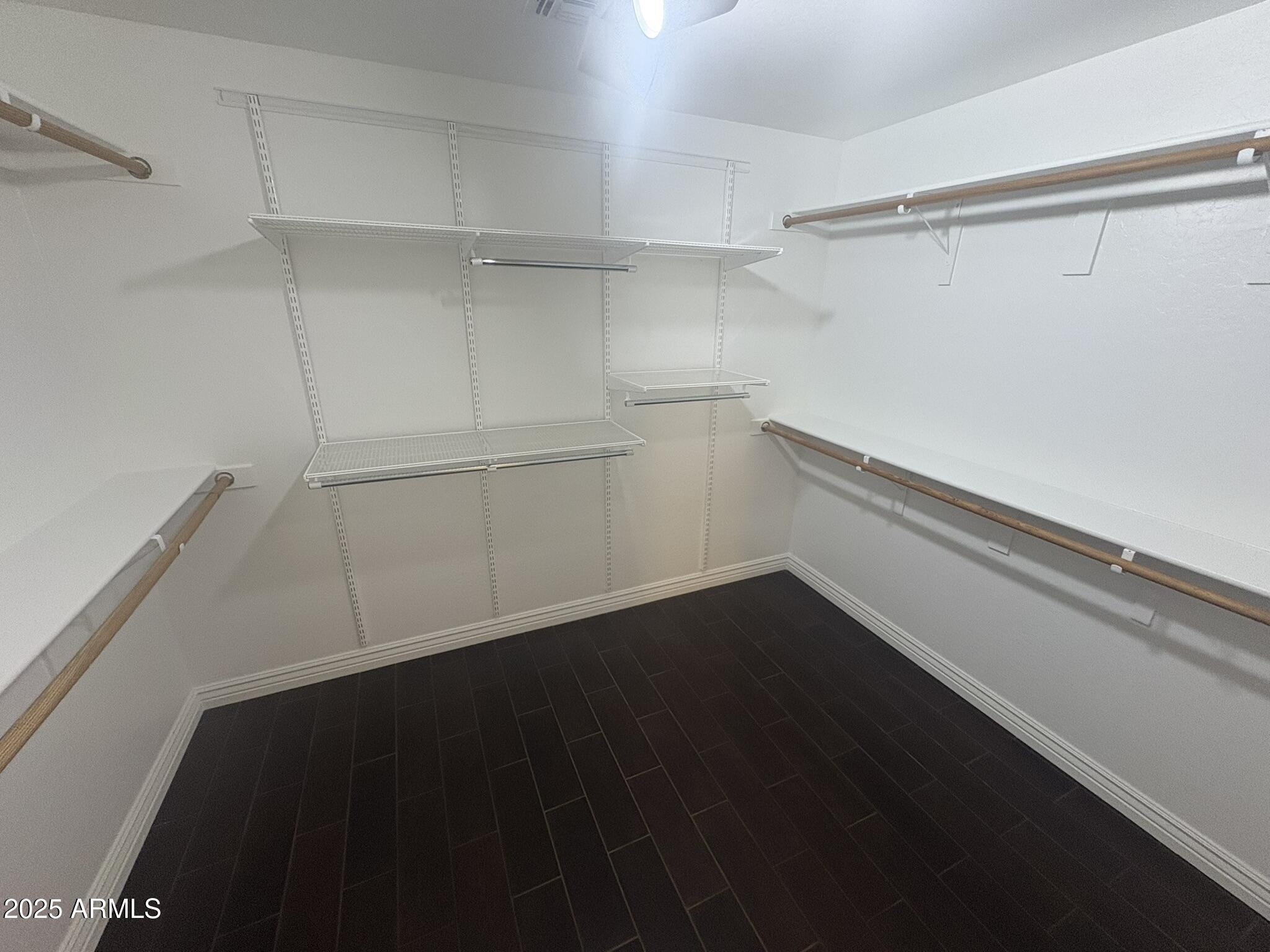 17633 North 41st Street Phoenix, AZ 85032 - Photo 22 of 24 a view of an empty walk in closet